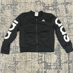 Back Adidas jacket. Pre loved in good condition.